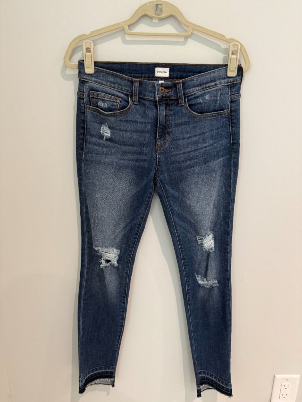 Sneak Peek Distressed Step Hem Skinny Jeans size 7